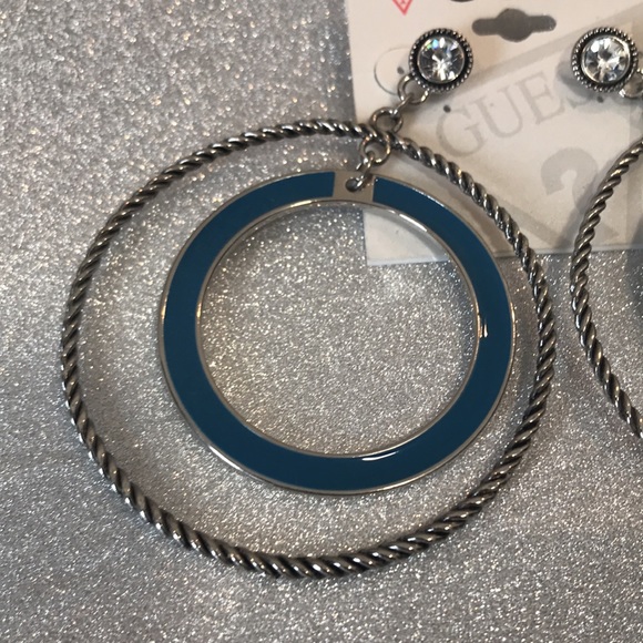 Guess pierced earrings. Never worn. - Picture 2 of 3